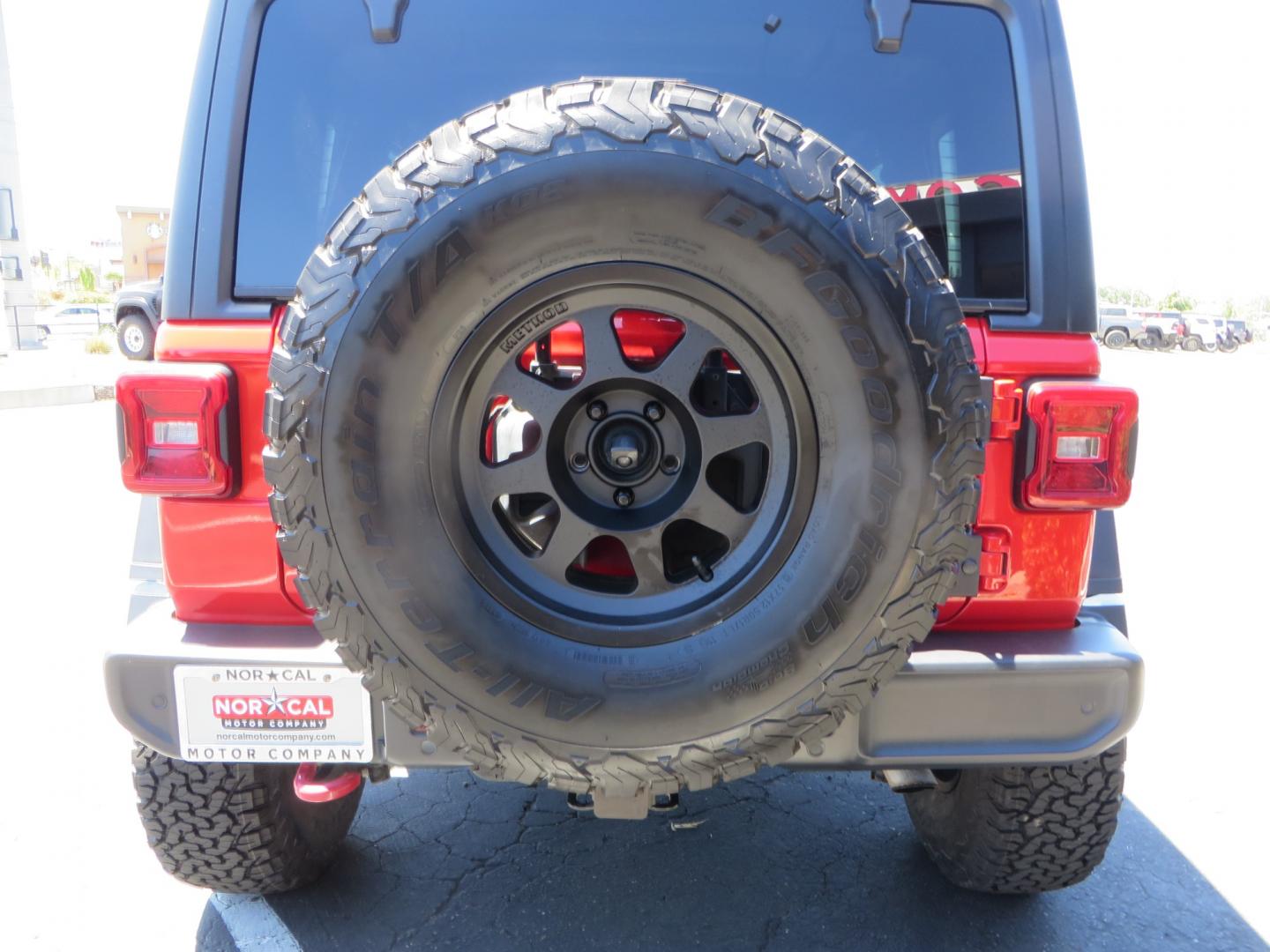 2019 Red /Black Jeep Wrangler Unlimited Rubicon (1C4HJXFN7KW) with an 2.0L L4 DOHC 16V TURBO engine, automatic transmission, located at 2630 Grass Valley Highway, Auburn, CA, 95603, (530) 508-5100, 38.937893, -121.095482 - Rubicon JL ready for all of your offroad adventures. This Jeep is sitting on a Rubicon Express lift kit, RE 2.5 Extreme series shocks, 17" Method bead grip wheels, 37" BFG KO2 tires, EVO front bumper, Warn winch, Road Armor rock slliders, and a HD Jeep spare tire carrier. - Photo#13